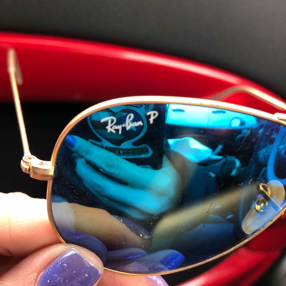 Ray Ban sunglasses.
